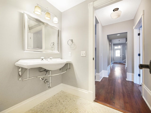 bathroom with tile patterned flooring and sink