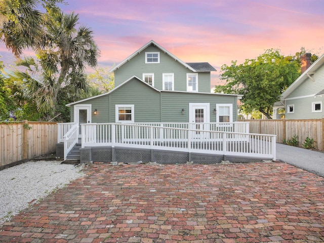 view of front of home featuring a wooden deck