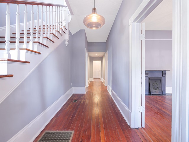 corridor featuring hardwood / wood-style flooring