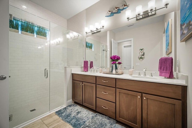 118 Lamego Ln, Saint Augustine, FL 32095 - full bath featuring a stall shower, double vanity, and a sink