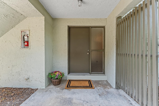 7 Andalusia Ct, Saint Augustine, FL 32086 - view of exterior entry featuring stucco siding