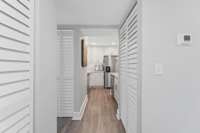 7 Andalusia Ct, Saint Augustine, FL 32086 - hall with dark wood finished floors and recessed lighting