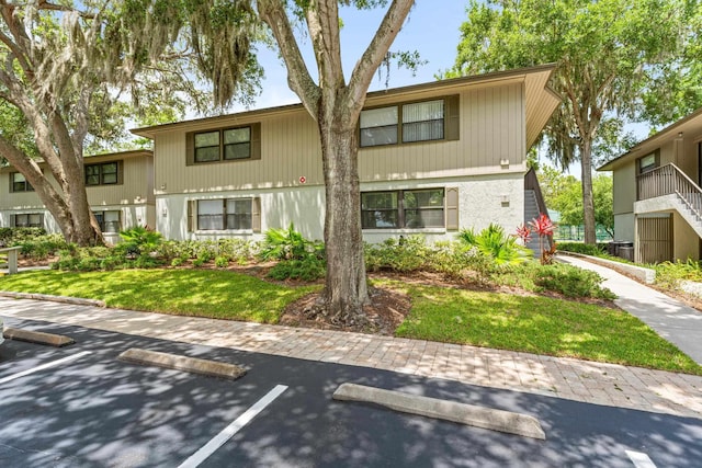 7 Andalusia Ct, Saint Augustine, FL 32086 - view of front of property with uncovered parking and a front lawn
