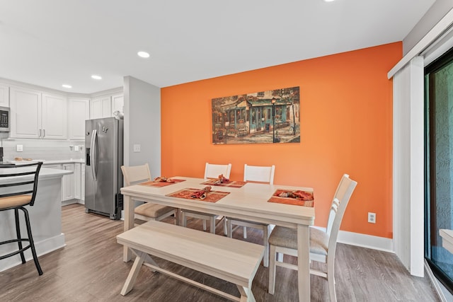 7 Andalusia Ct, Saint Augustine, FL 32086 - dining space featuring light wood-style flooring and recessed lighting