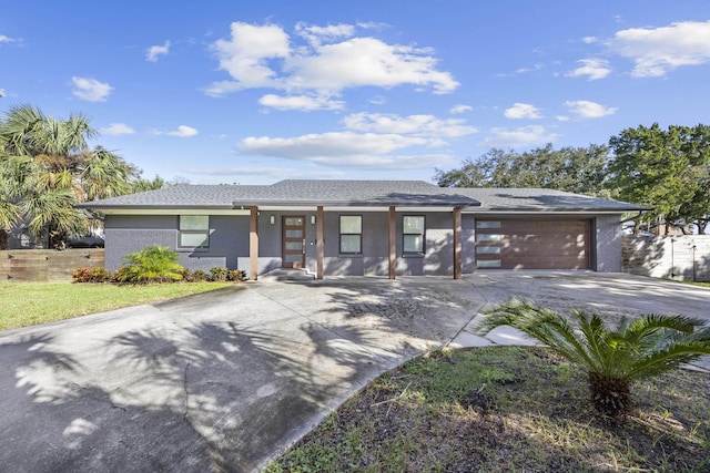50 Dufferin St, Saint Augustine, FL 32084 - view of front of home featuring driveway, a garage, and a porch