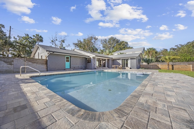 view of pool featuring a patio