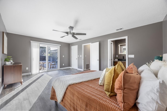 bedroom featuring wood-type flooring, access to outside, and ceiling fan