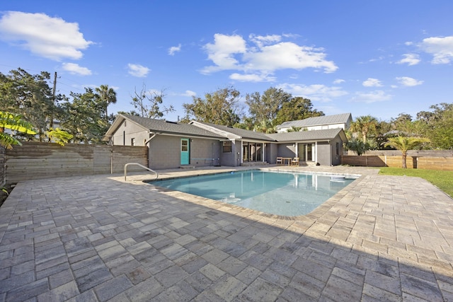 50 Dufferin St, Saint Augustine, FL 32084 - view of swimming pool featuring a patio and a fenced backyard