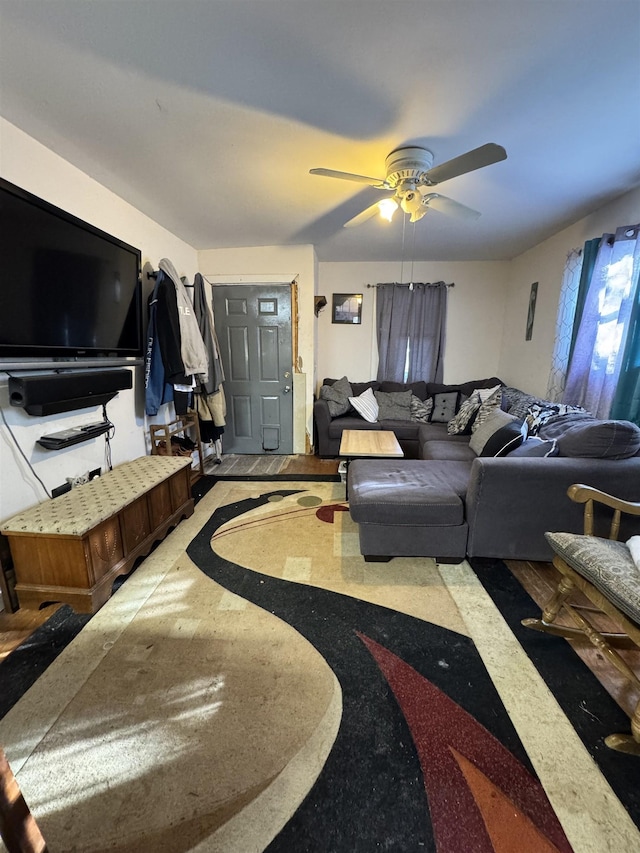 living room featuring ceiling fan