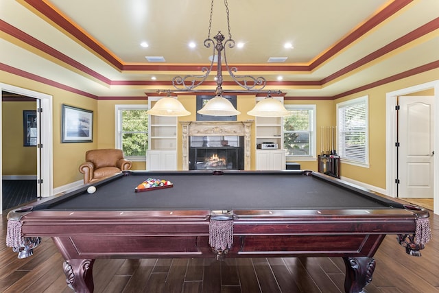 playroom featuring a tile fireplace, wood-type flooring, crown molding, and pool table