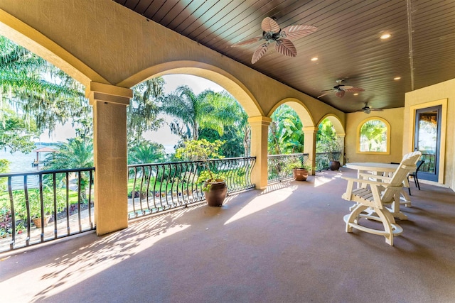 view of patio featuring ceiling fan