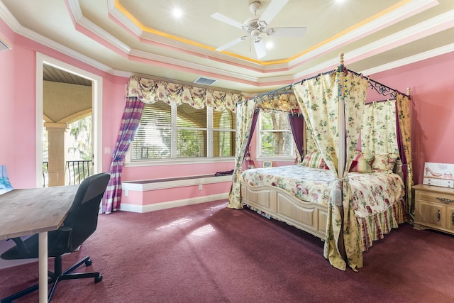 bedroom featuring carpet flooring, ceiling fan, a raised ceiling, and ornamental molding