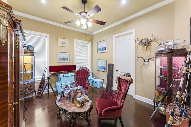 interior space featuring ceiling fan, crown molding, and dark wood-type flooring