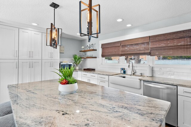 7201 A1A S, Saint Augustine, FL 32080 - kitchen with stainless steel dishwasher, white cabinets, a sink, and open shelves