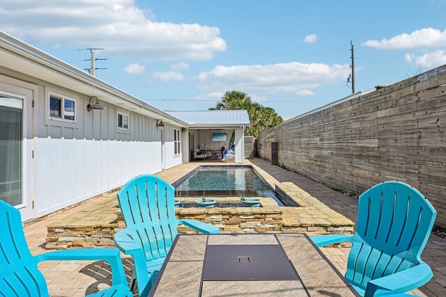 7201 A1A S, Saint Augustine, FL 32080 - view of pool featuring a patio area, a fenced backyard, and a fenced in pool