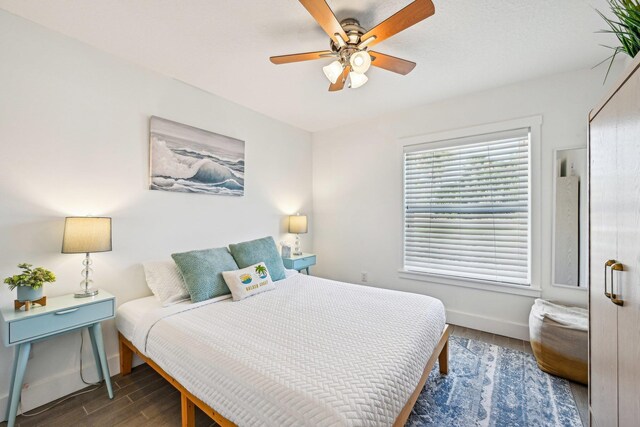7201 A1A S, Saint Augustine, FL 32080 - bedroom featuring ceiling fan, baseboards, and wood finished floors