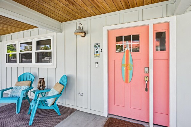 7201 A1A S, Saint Augustine, FL 32080 - view of exterior entry featuring a porch and board and batten siding