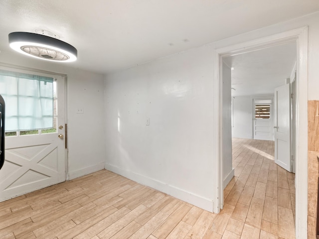 foyer with light wood-type flooring