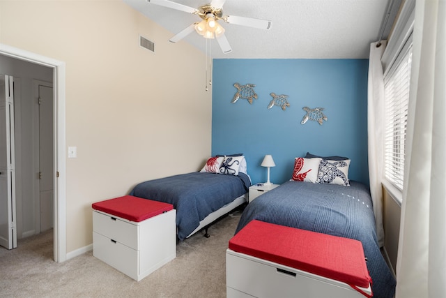 2900 Coastal Hwy, Saint Augustine, FL 32084 - bedroom with ceiling fan, visible vents, light colored carpet, and multiple windows