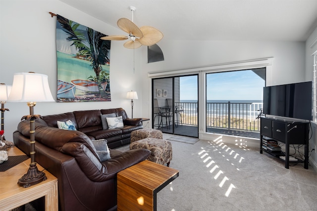 2900 Coastal Hwy, Saint Augustine, FL 32084 - living room featuring vaulted ceiling, carpet, and ceiling fan