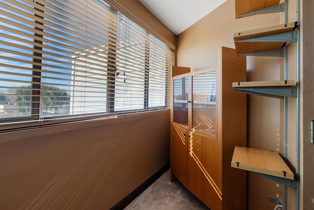 2900 Coastal Hwy, Saint Augustine, FL 32084 - interior space featuring lofted ceiling and dark colored carpet