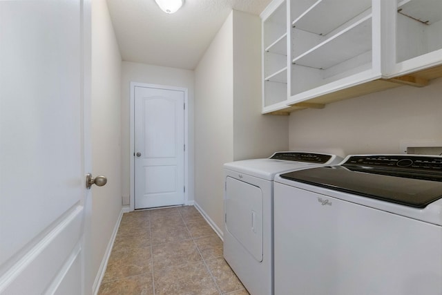 washroom with light tile patterned flooring and independent washer and dryer