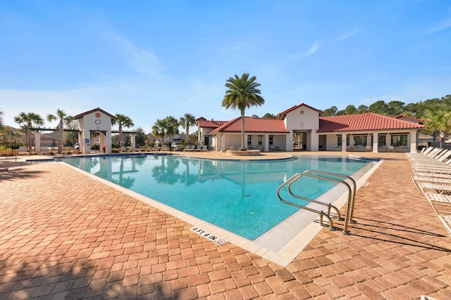 view of swimming pool featuring a patio