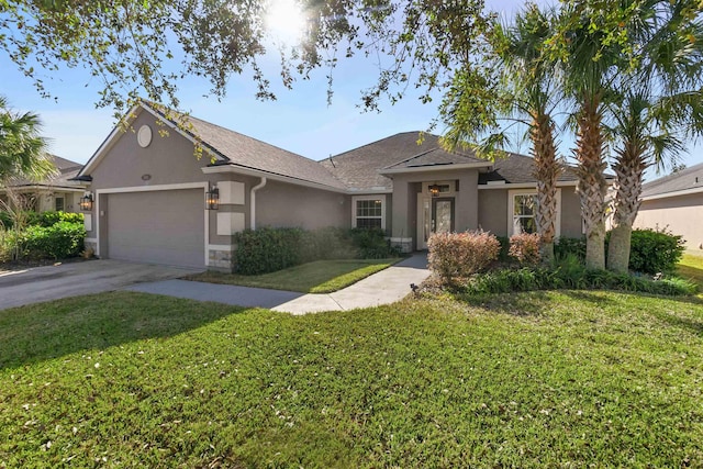 ranch-style house featuring a garage and a front yard