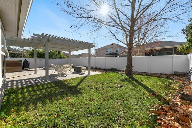 view of yard with a pergola and a patio