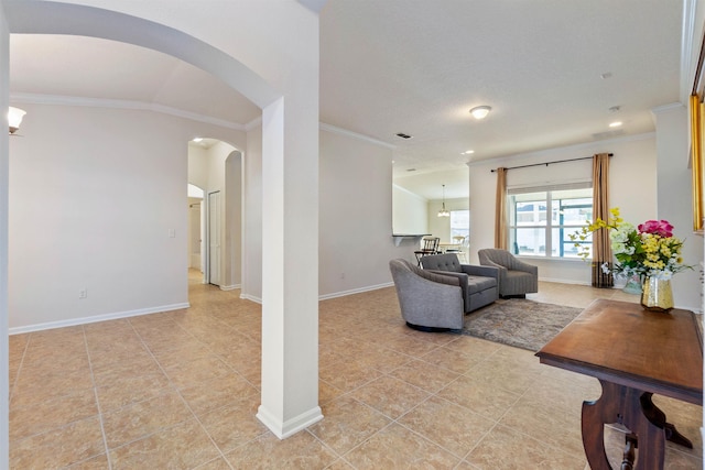 tiled living room with crown molding and vaulted ceiling