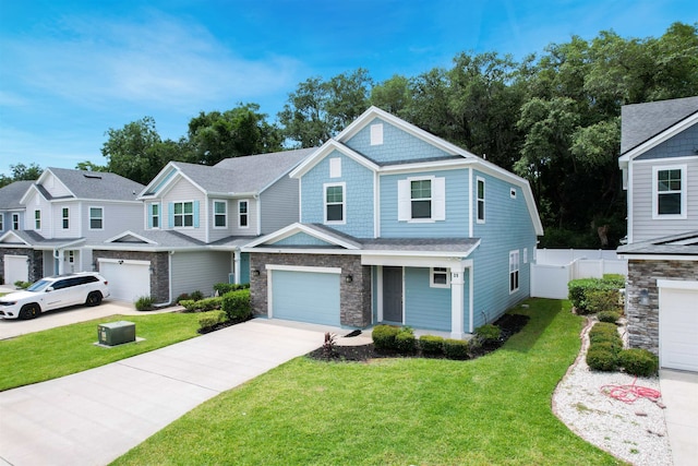 view of front facade featuring a front yard and a garage