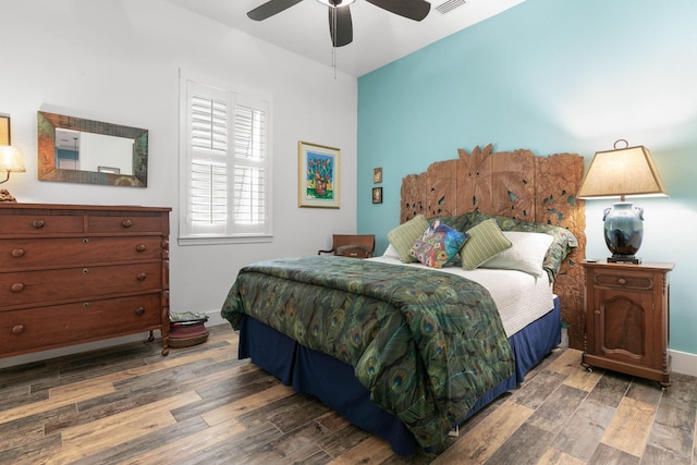 bedroom featuring hardwood / wood-style flooring and ceiling fan