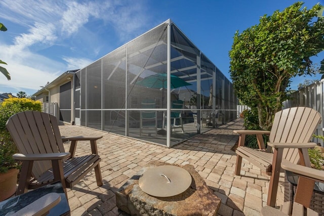 view of patio / terrace with glass enclosure