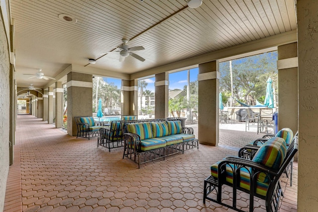 view of patio / terrace with outdoor lounge area and ceiling fan