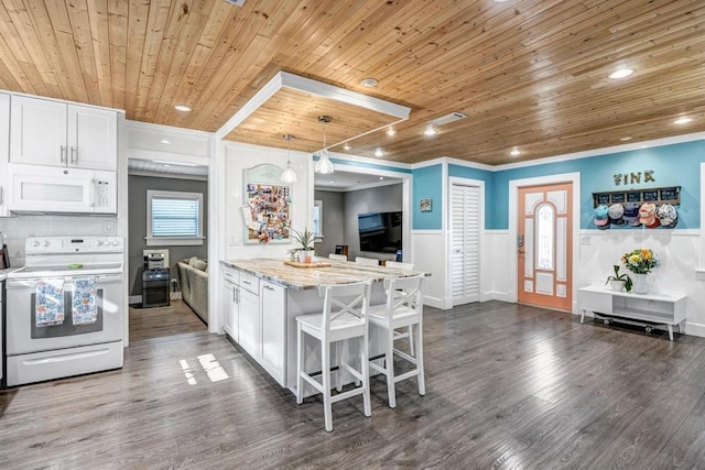 kitchen featuring wainscoting, white appliances, wood ceiling, and white cabinetry