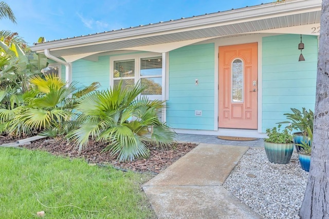 doorway to property with a porch