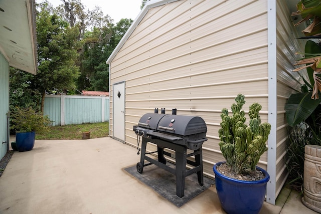 view of patio with fence and grilling area