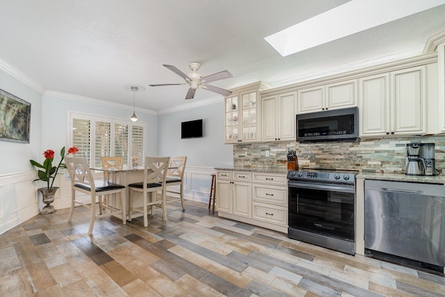 kitchen with electric stove, crown molding, tasteful backsplash, cream cabinets, and dishwasher