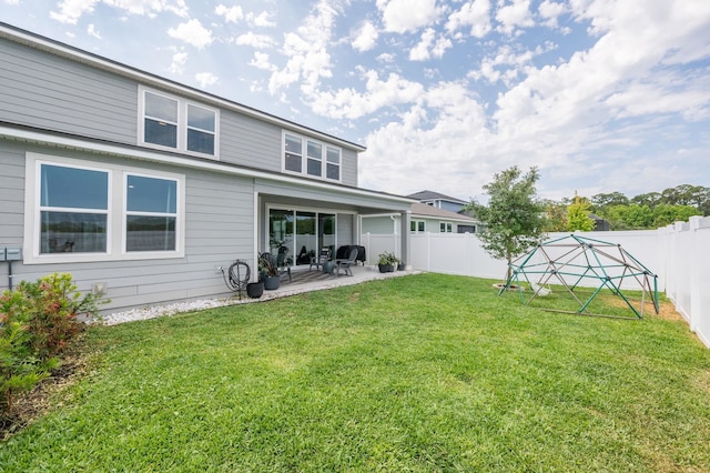 back of house featuring a patio