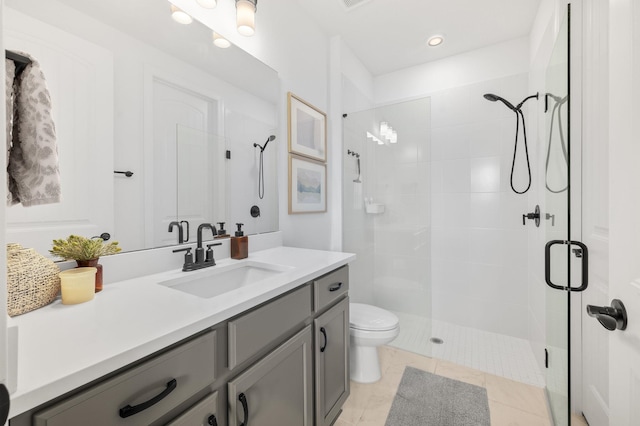 full bath with a shower stall, vanity, toilet, recessed lighting, and tile patterned flooring