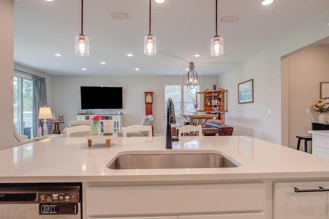 24 Pepperpike Way, Saint Augustine, FL 32092 - kitchen featuring open floor plan, a sink, dishwasher, light countertops, and recessed lighting