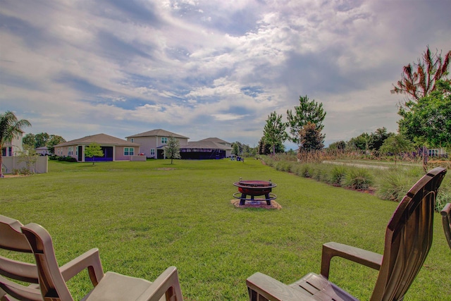24 Pepperpike Way, Saint Augustine, FL 32092 - view of green lawn featuring a fire pit