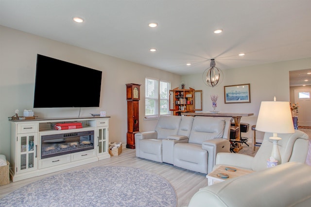 24 Pepperpike Way, Saint Augustine, FL 32092 - living room featuring a chandelier, light wood-style floors, recessed lighting, and baseboards
