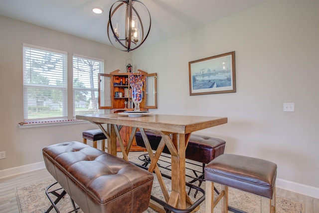 24 Pepperpike Way, Saint Augustine, FL 32092 - dining space featuring a chandelier, baseboards, light wood-style flooring, and recessed lighting