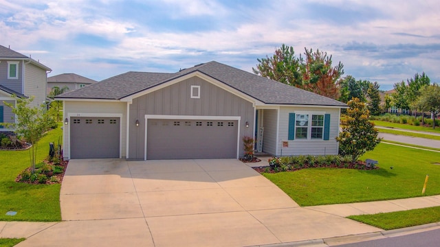 24 Pepperpike Way, Saint Augustine, FL 32092 - single story home with a garage, board and batten siding, driveway, a front lawn, and roof with shingles