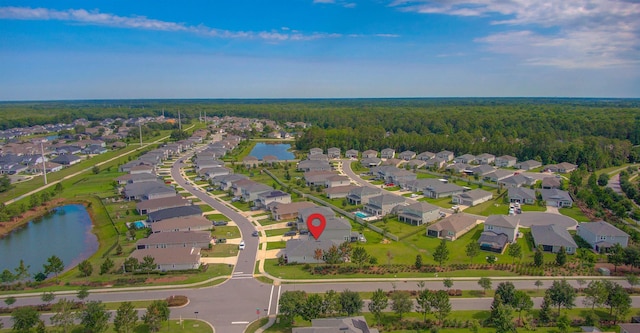 24 Pepperpike Way, Saint Augustine, FL 32092 - aerial overview of property's location with nearby suburban area, a nearby body of water, and a forest