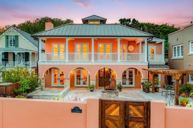 view of patio terrace at dusk