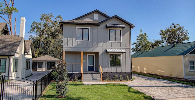 view of front of property with a front lawn