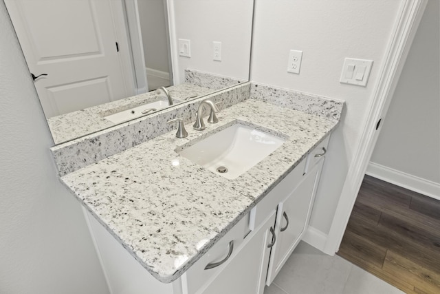 bathroom with vanity and tile patterned floors