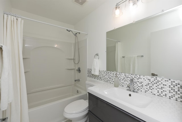 bathroom with shower / tub combo, tasteful backsplash, visible vents, toilet, and vanity